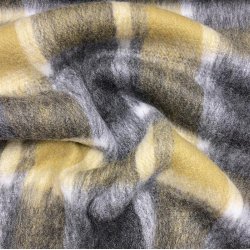 Uldkvalitet med gr og grnlige tern - pr. 0,25 meter