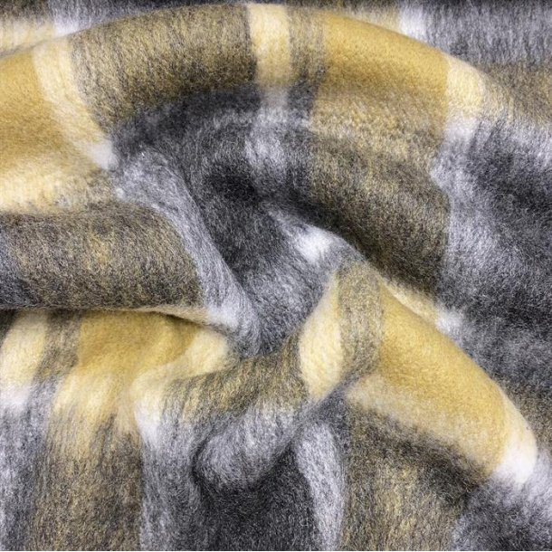 Uldkvalitet med gr og grnlige tern - pr. 0,25 meter