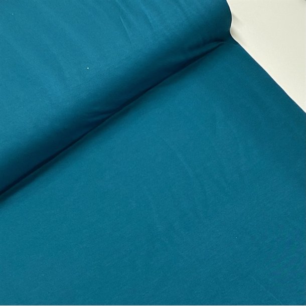 Den lkre viskose jersey i petrol - pr. 0,25 meter