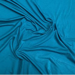 Den lkre viskose jersey i petrol - pr. 0,25 meter
